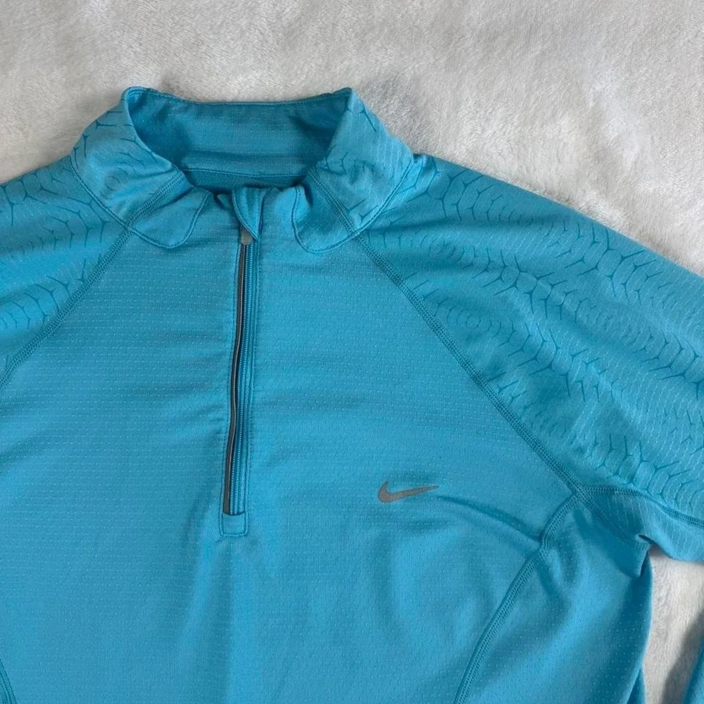 Nike teal zip